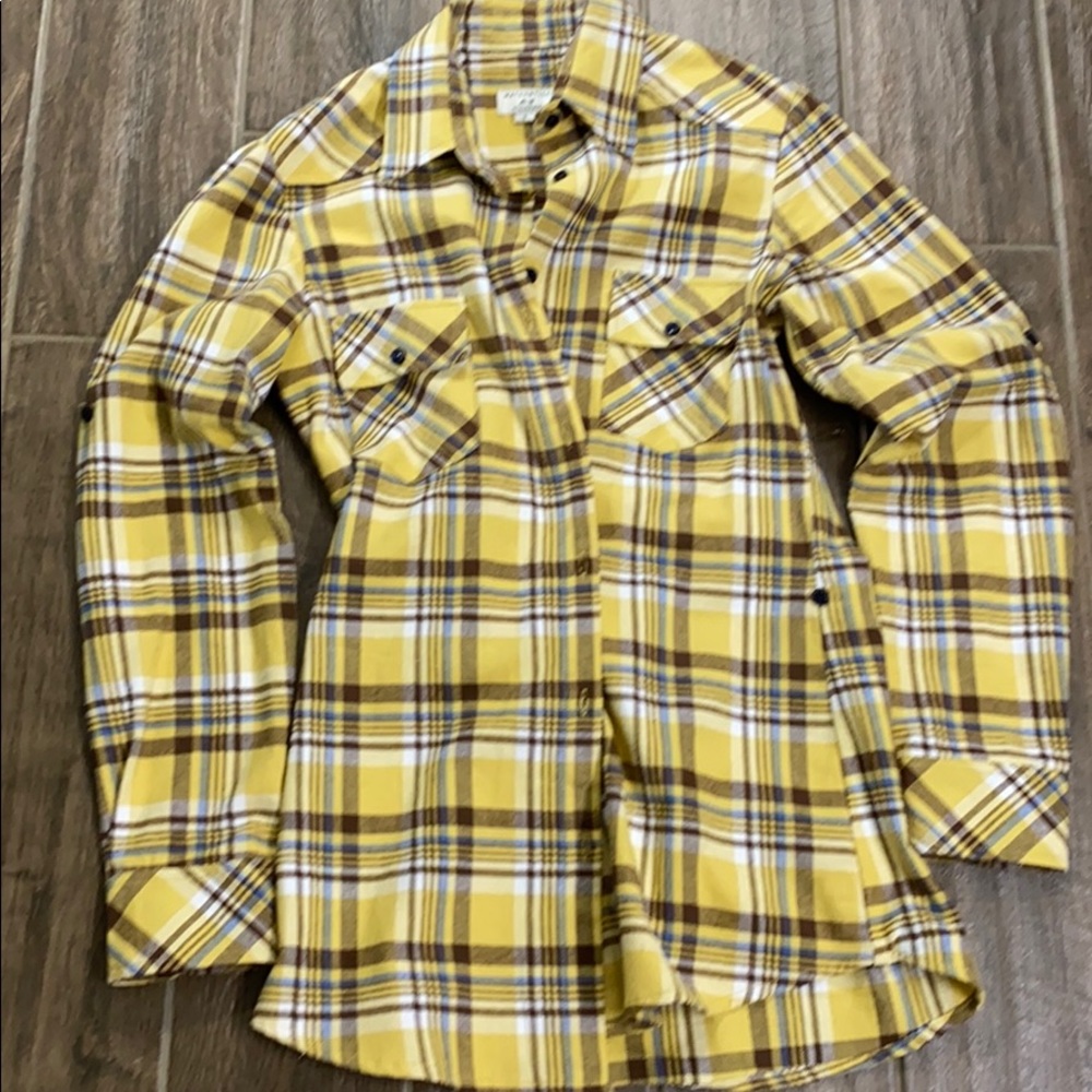 Tunic length,yellow, blue and brown flannel shirt.